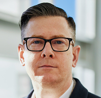 Alexander Hughes, chief executive officer at a crypto trading company, executive portrait